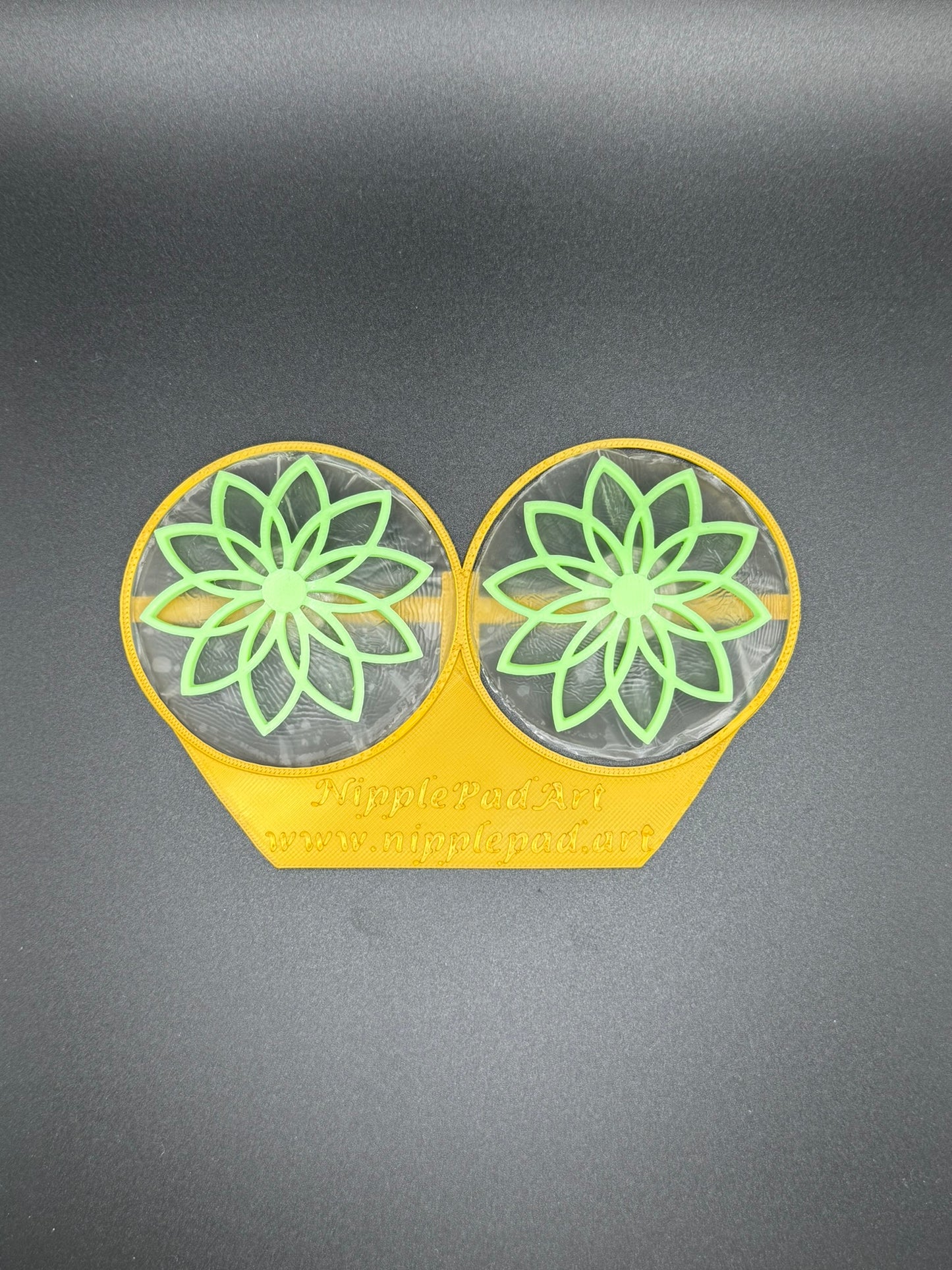Wiederverwendbare Nippelpads mit Lotus-Design - UV-aktiv - Neongrün