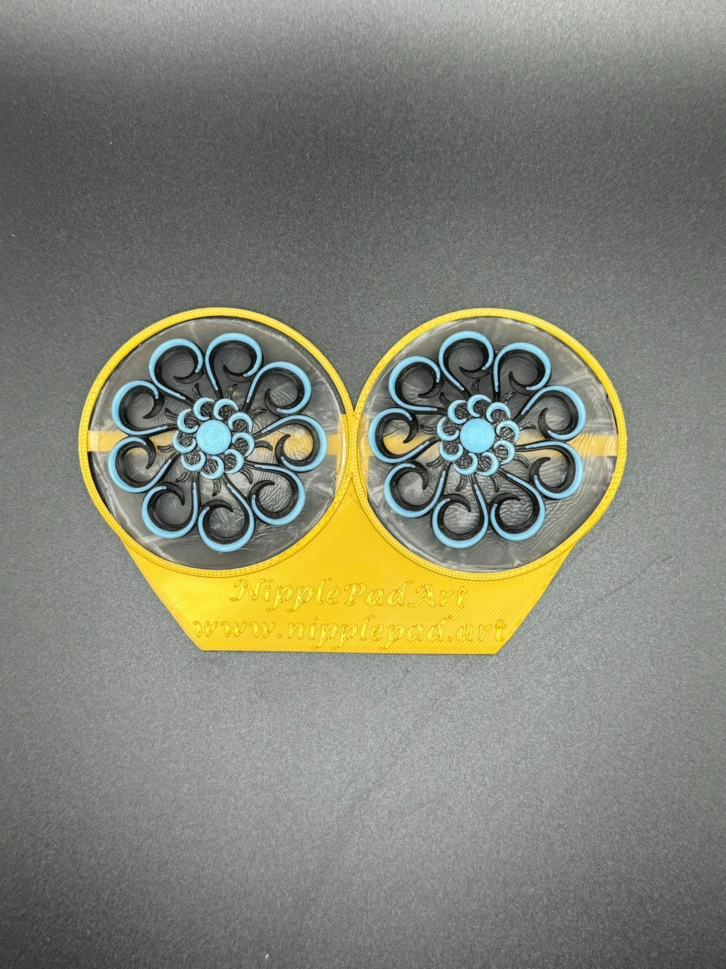 Wiederverwendbare Nippelpads mit Blumenmuster - UV-aktiv - Neonblau